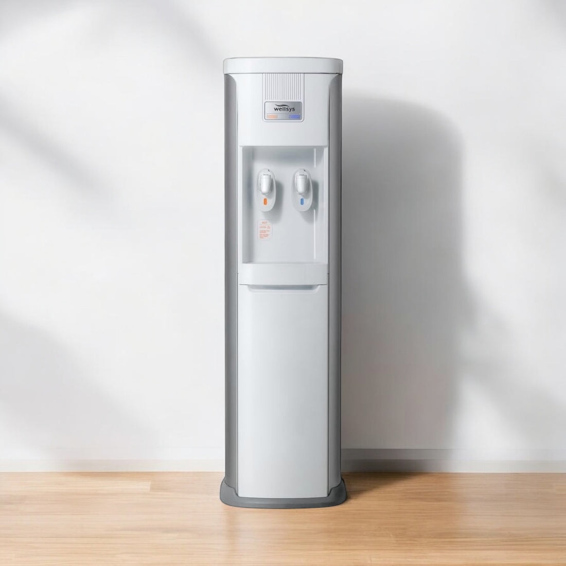 vidoe: How to change the filters in your water cooler. cover image is a Wellsys model 8020 water cooler sitting on hardwood floor in an empty room. 